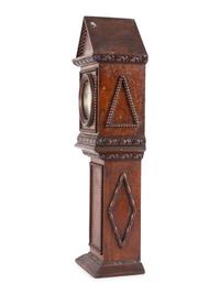 A Miniature Carved Tall Case Clock