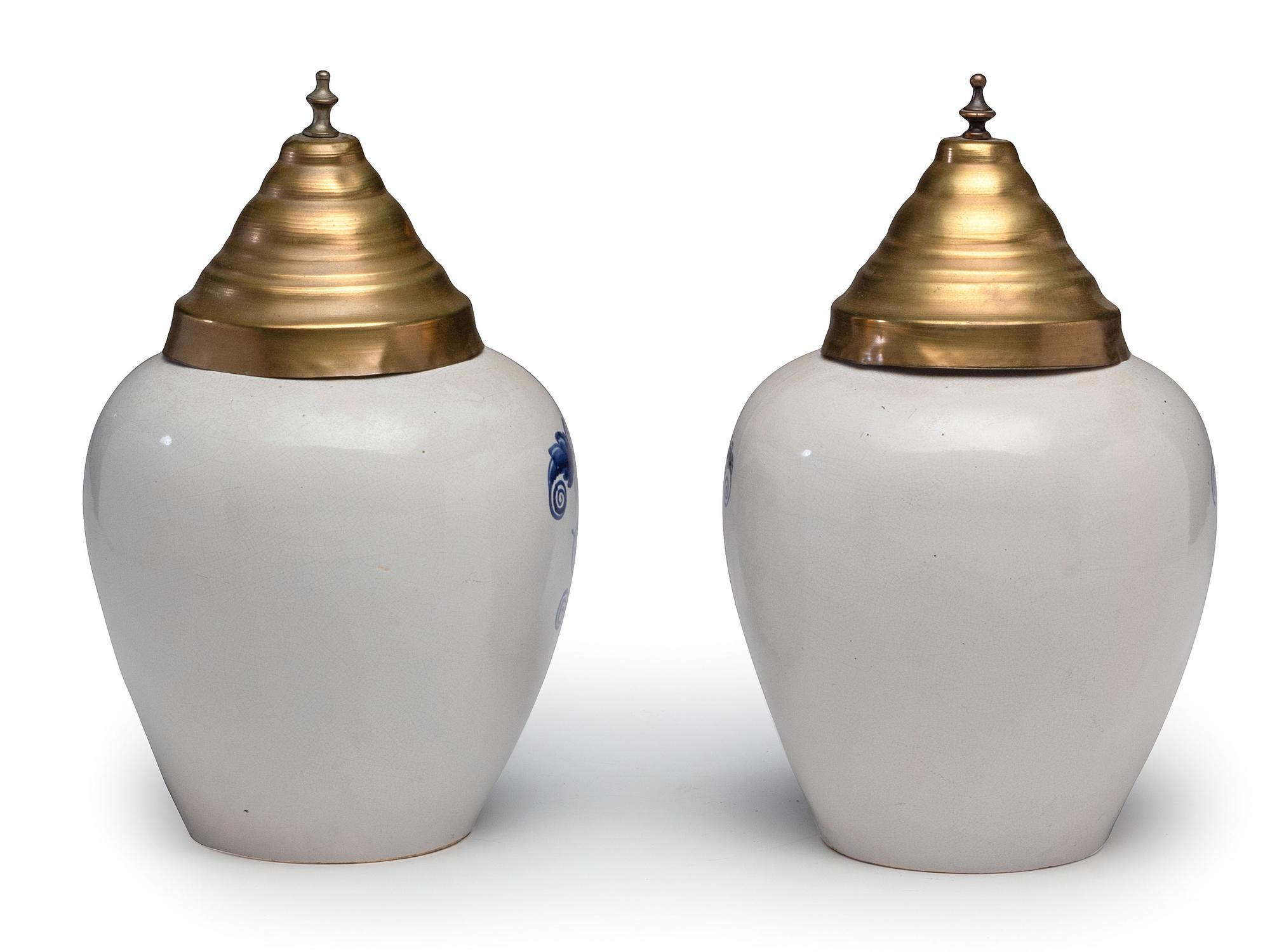 A Pair of Delft Lidded Tobacco Jars