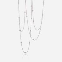 A pair of eighteen karat gold and diamond chains