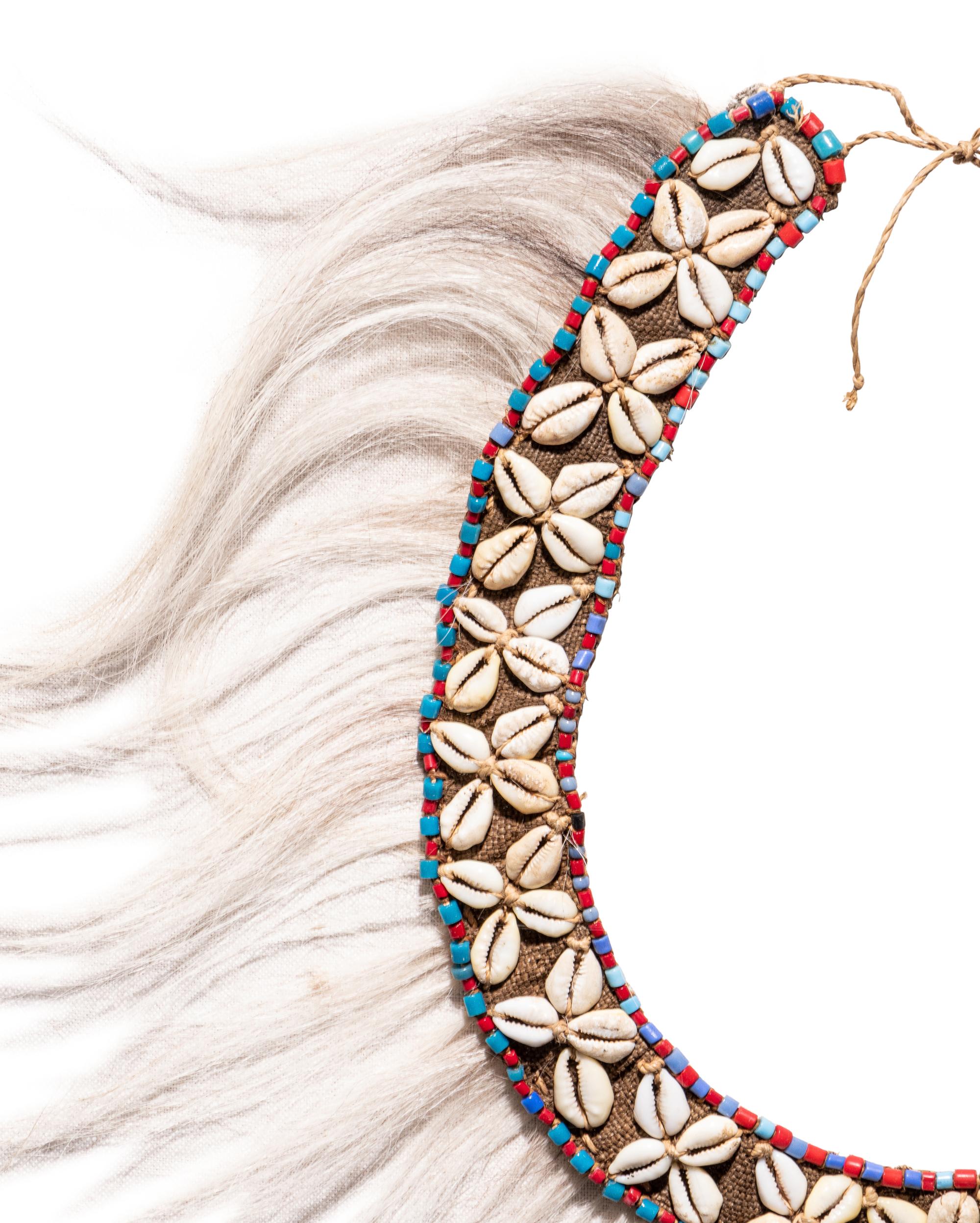 A Group of Four Amazonian Shell Belts or Headdresses