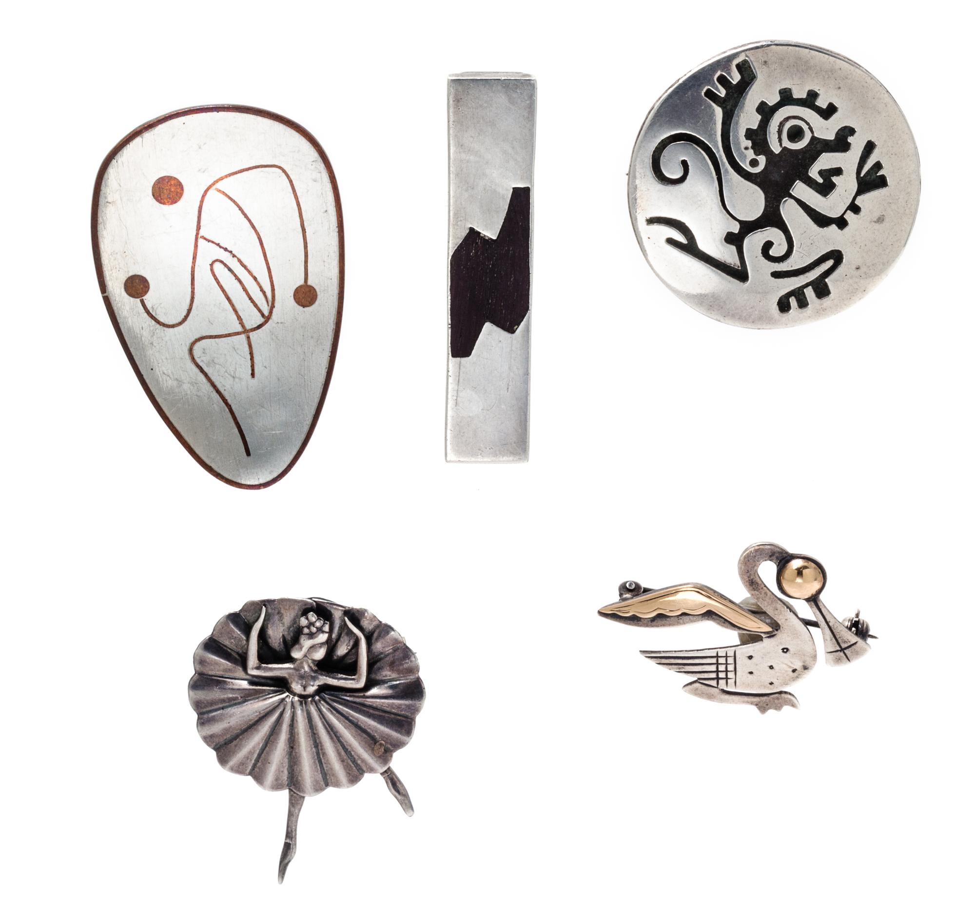 A Collection of Silver, Copper, 18 Karat Gold and Hardwood Brooches and Tie Bar, 28.70 dwts.