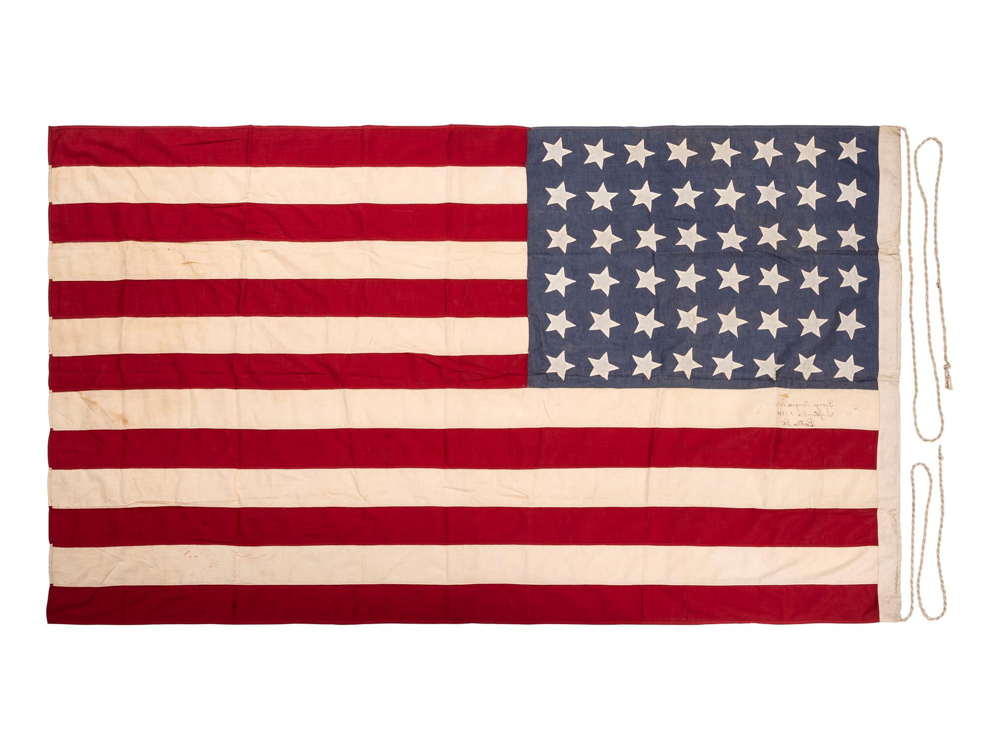 [FLAGS]. A group of 2 American flags, incl. 45-star and 48-star examples. Late 19th-early 20th century.