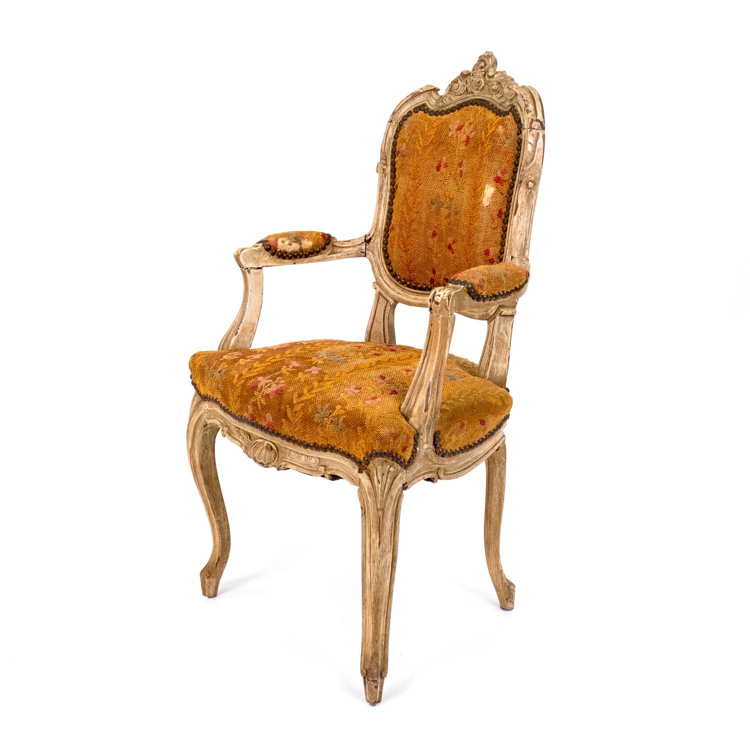 A Louis XV Style Carved Diminutive Fauteuil — LATE 18TH / EARLY 19TH CENTURY