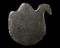 An Egyptian Greywacke Cosmetic Palette in the Form of a Bird