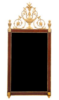 A Neoclassical Mahogany and Parcel Gilt Mirror, Height 61 x width 23 1/4 inches.