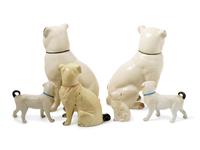 A Group of Glazed Ceramic Pug Figures