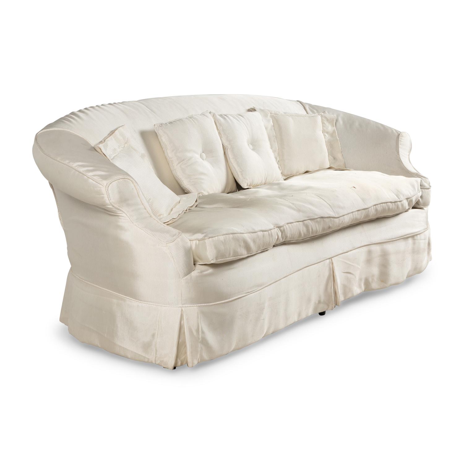 A Cream Silk-Slipcovered Reniform Sofa
