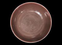A Chinese copper red glazed dish, Daoguang mark and period 銅紅釉盤 道光款 清道光