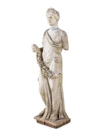 A Carved Marble Figure of a Maiden with Garlands