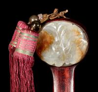 A Chinese Russet and Celadon Jade Inset Hardwood Ruyi Scepter