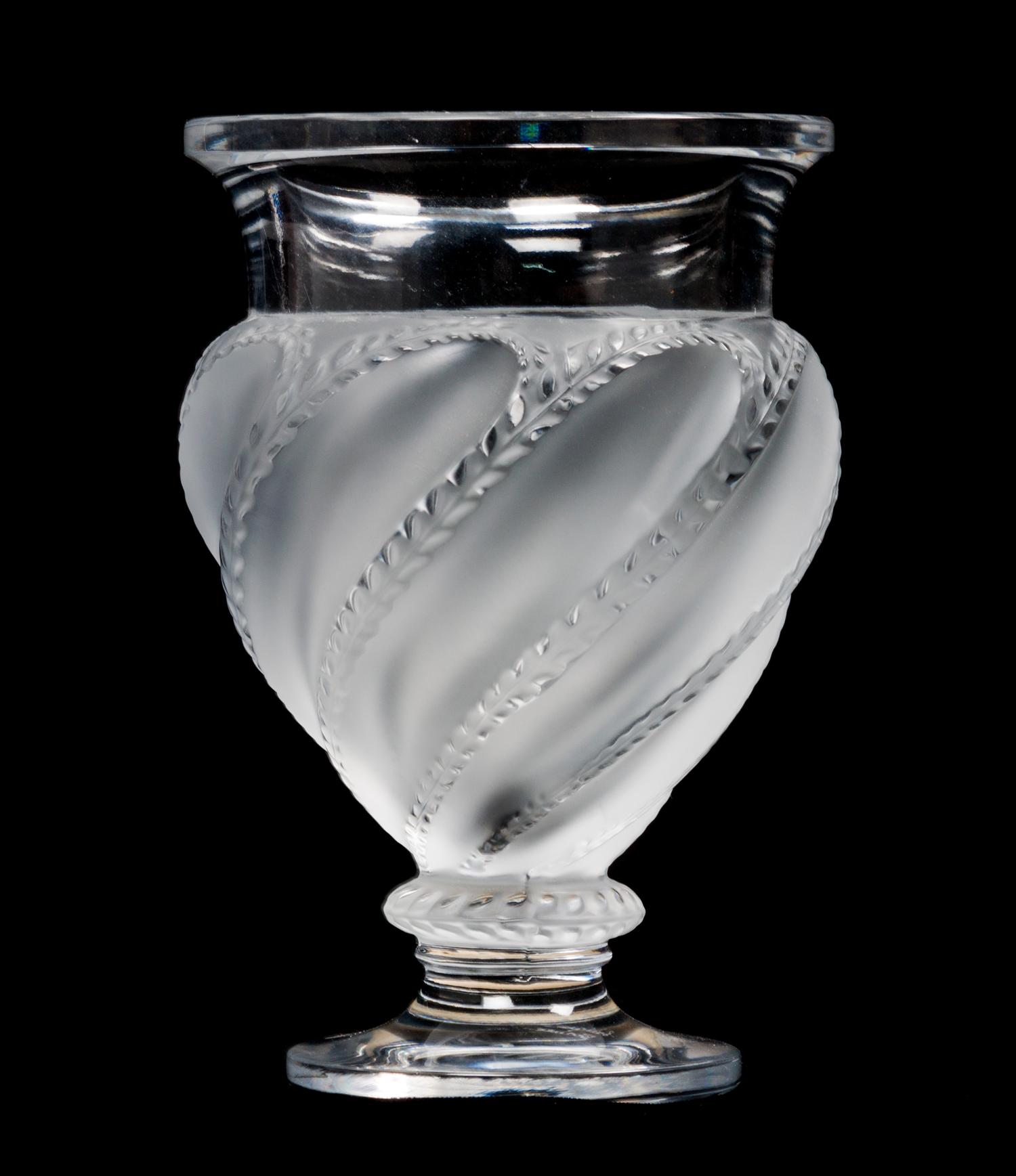 A Lalique Molded and Frosted Glass Vase Height 5 3/4 inches.