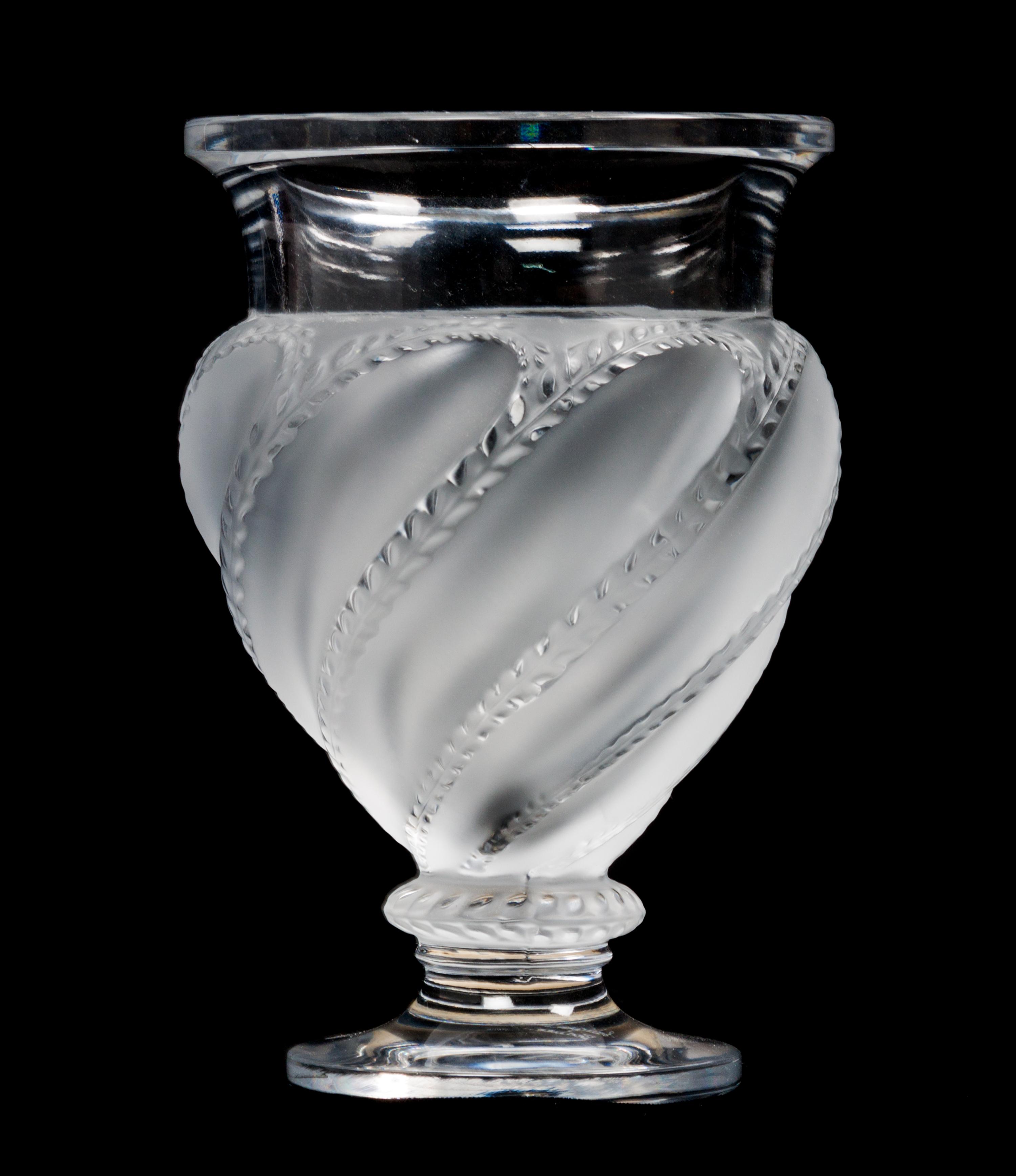 A Lalique Molded and Frosted Glass Vase Height 5 3/4 inches.