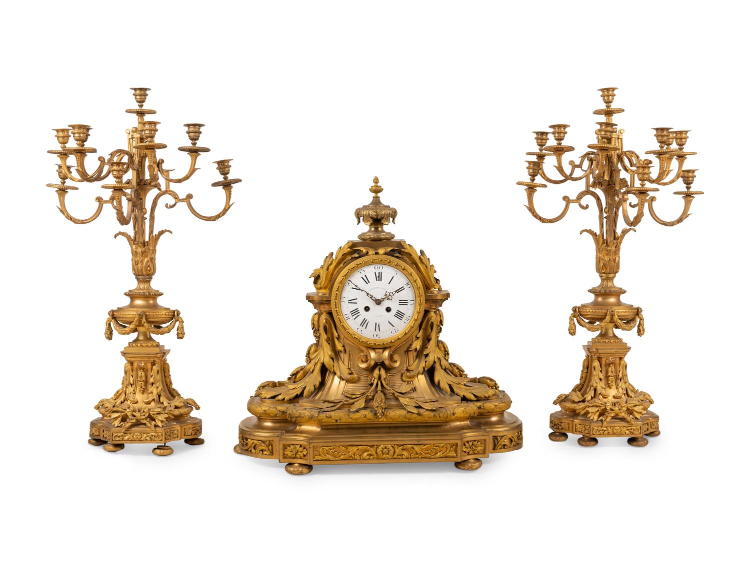 A Large French Gilt Bronze Clock Garniture