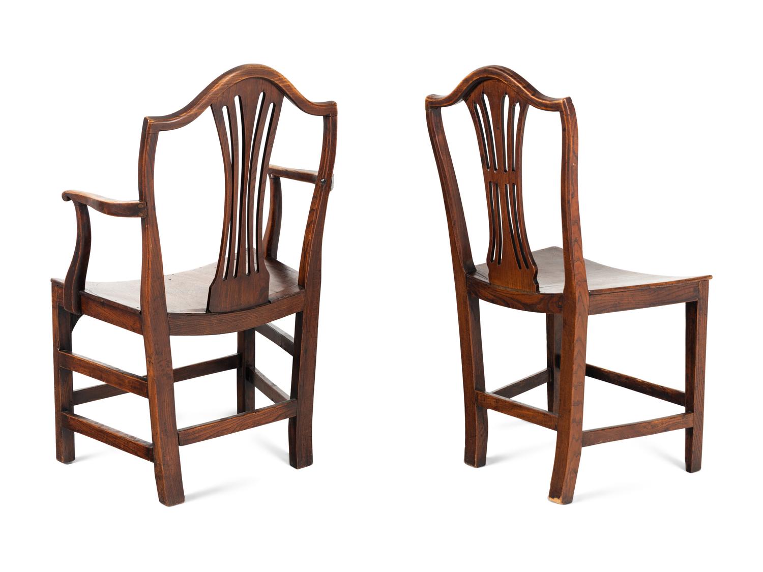 A Set of Six English Carved Oak Dining Chairs