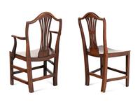 A Set of Six English Carved Oak Dining Chairs