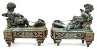 A Pair of Louis XVI Style Bronzed Metal Chenets Height 15 inches. — 19TH CENTURY