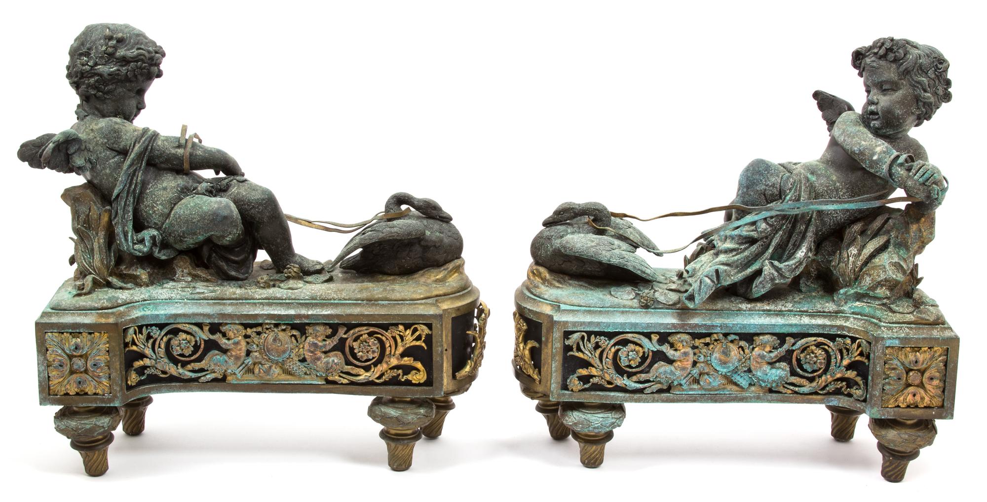 A Pair of Louis XVI Style Bronzed Metal Chenets Height 15 inches. — 19TH CENTURY