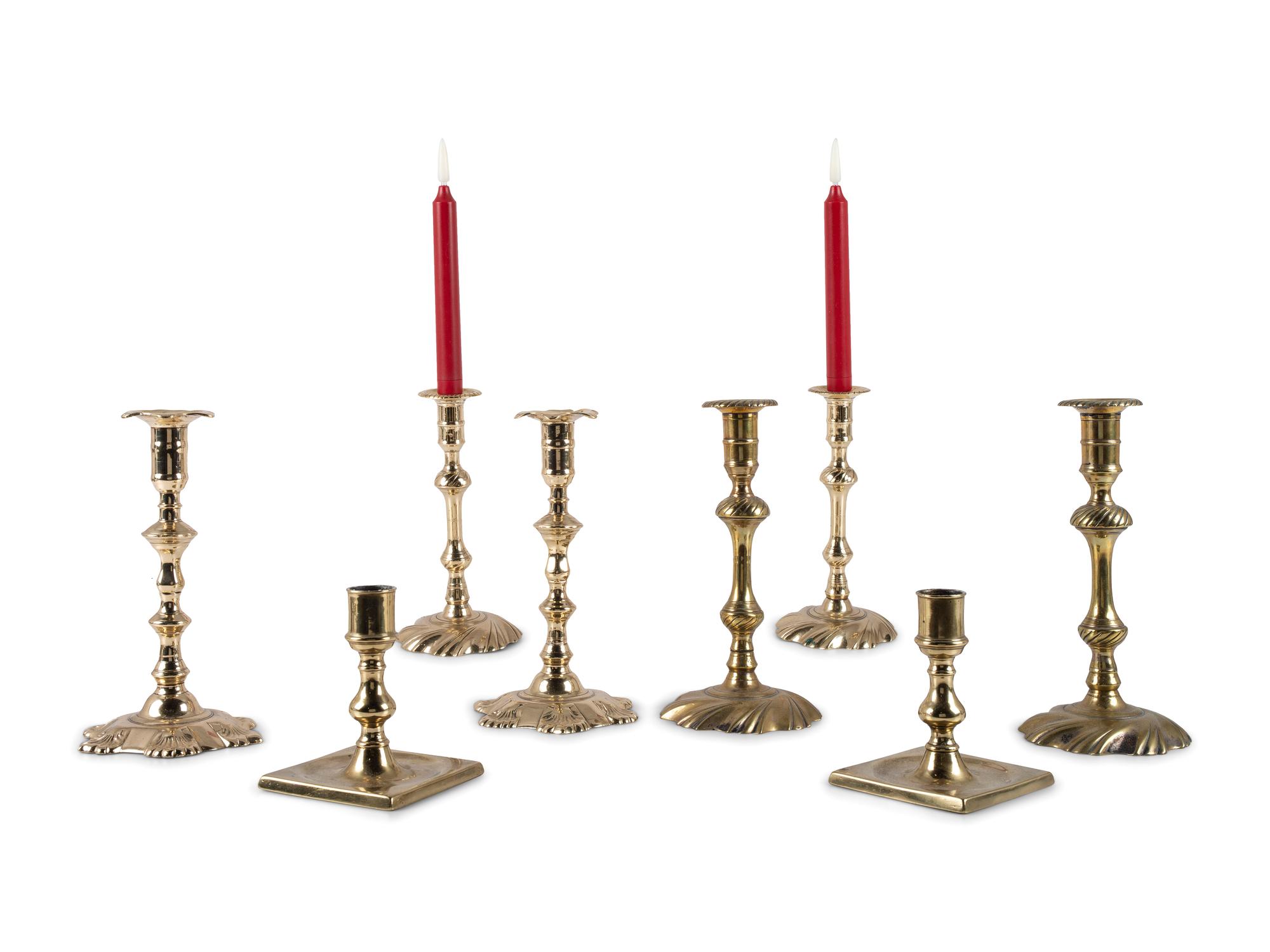 A Group of English Brass Candlesticks