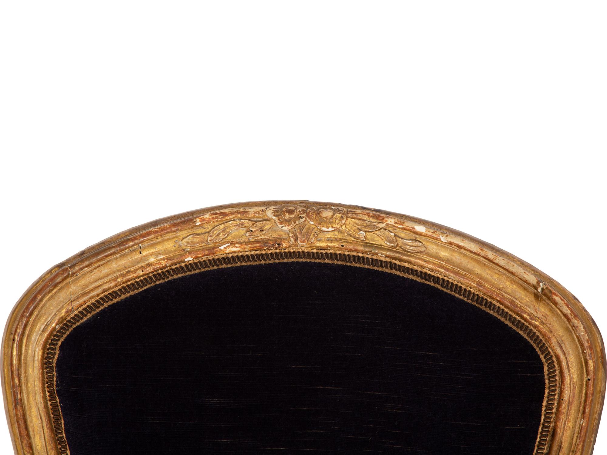 A Pair of Louis XV Giltwood Fauteuils