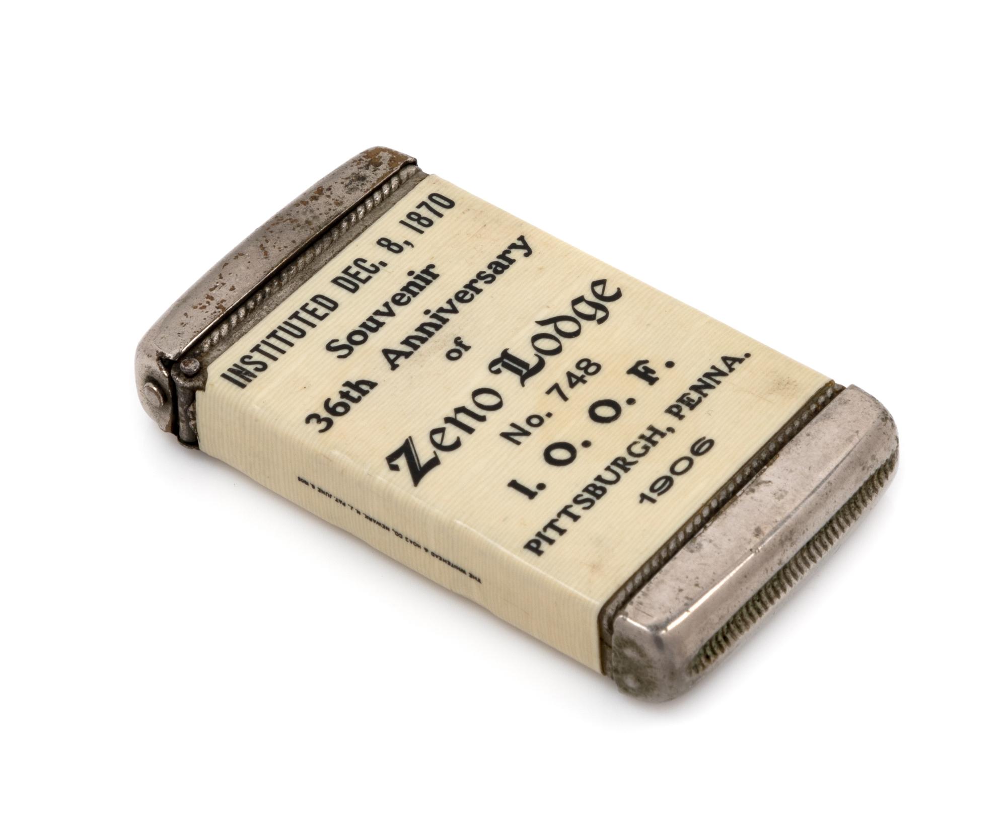 An American Independent Order of Odd Fellows Commemorative Celluloid and Mixed Metal Match Safe Height 2 3/4 inches. — 1906