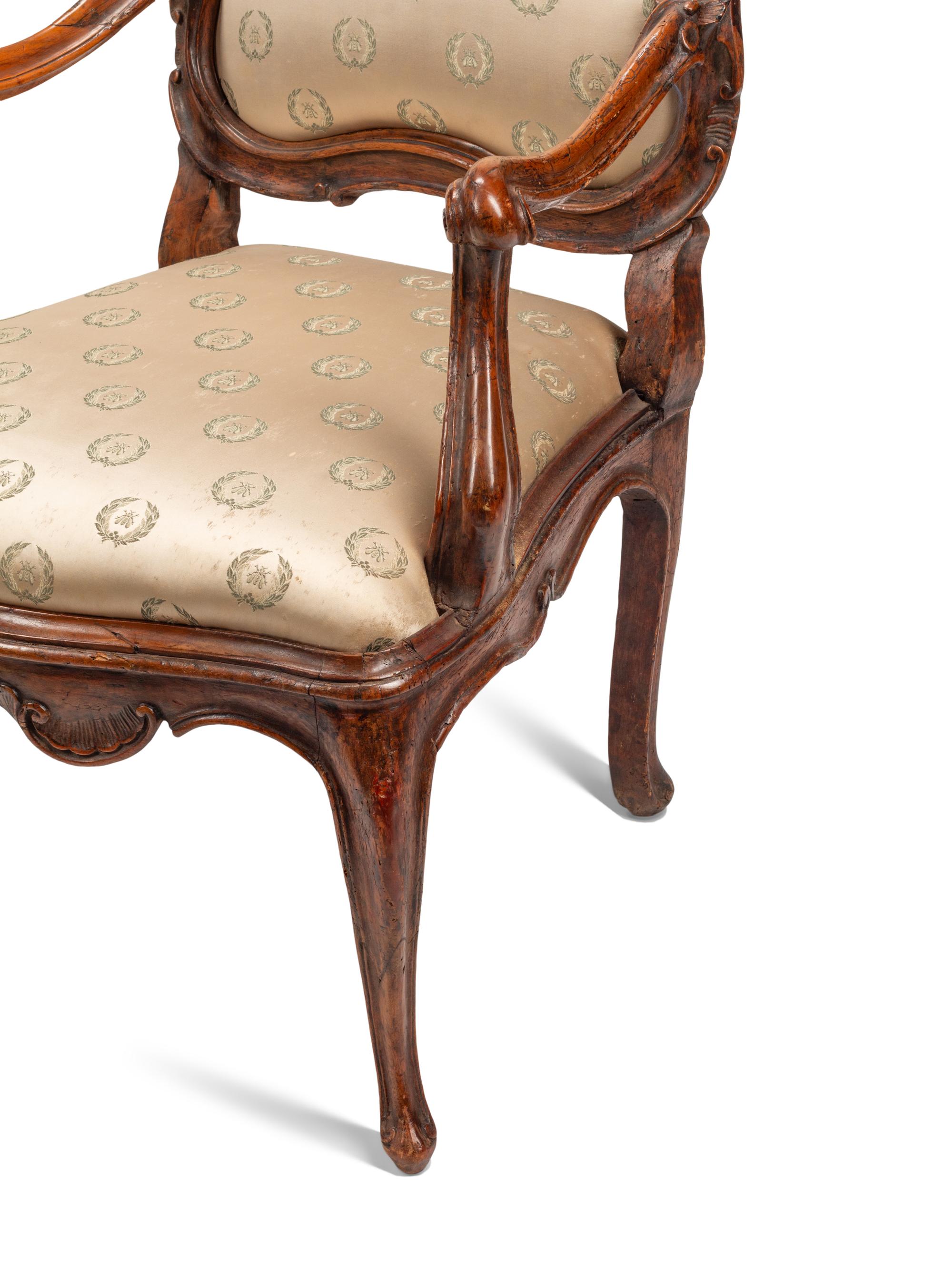 A Pair of Venetian Carved Walnut Armchairs