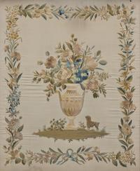 An English Regency Embroidered Silkwork Picture of a Floral Urn with Poodle