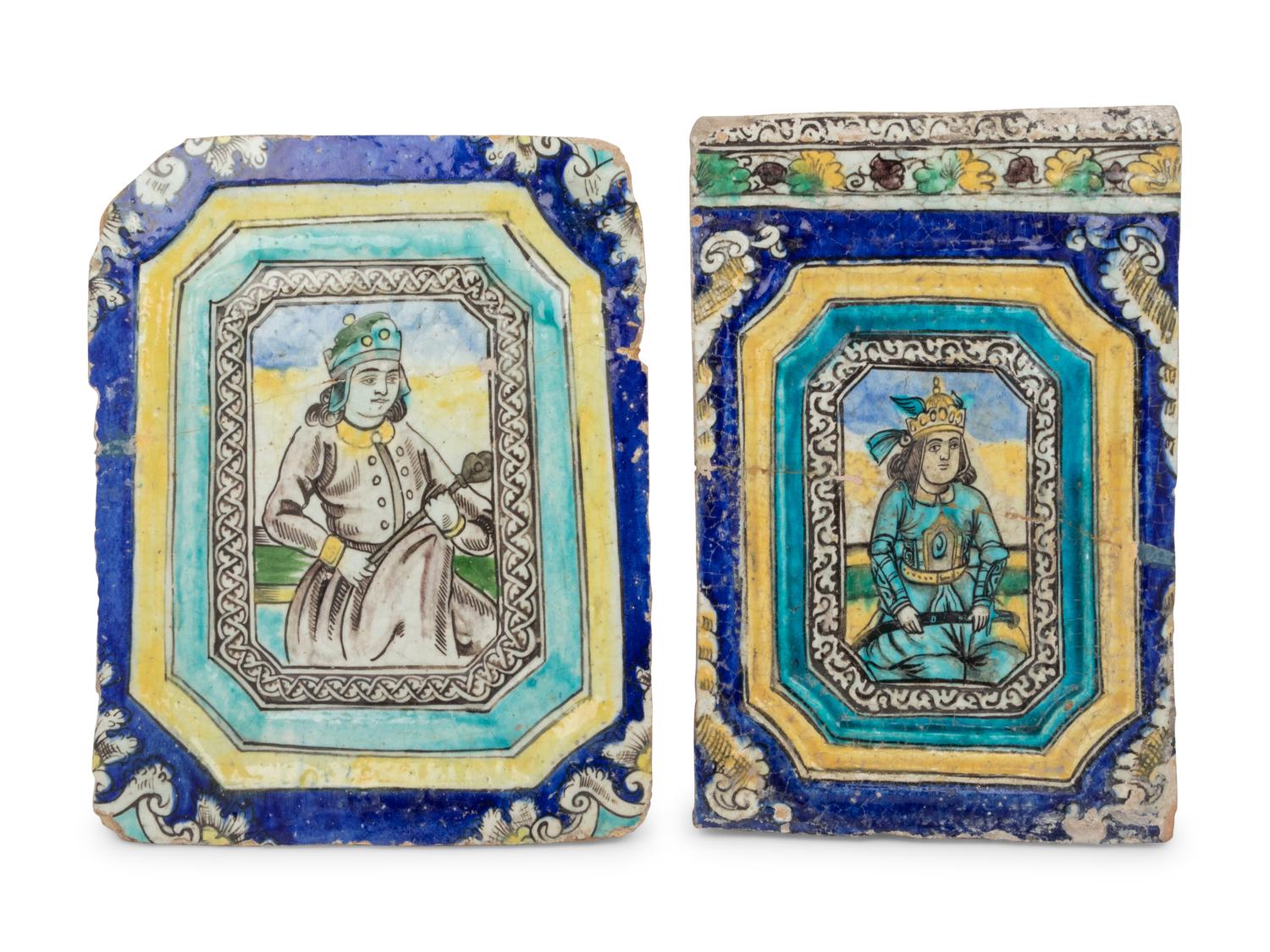 Two Qajar Molded Pottery Tiles