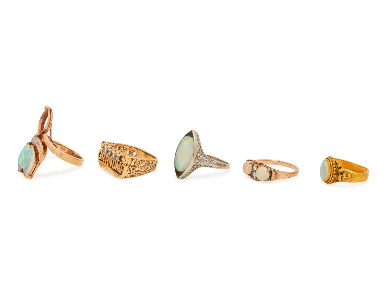 A Collection of Gold, Opal and Diamond Rings,