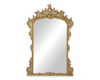 A French Rococo Revival green-painted and giltwood overmantel mirror, probably second half 19th century
