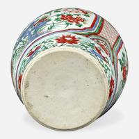 A Chinese wucai-decorated porcelain jar and cover