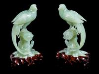 A Pair of Chinese Celadon Jade Figures of Pheasants Height of figure 6 3/4 inches. — 20TH CENTURY