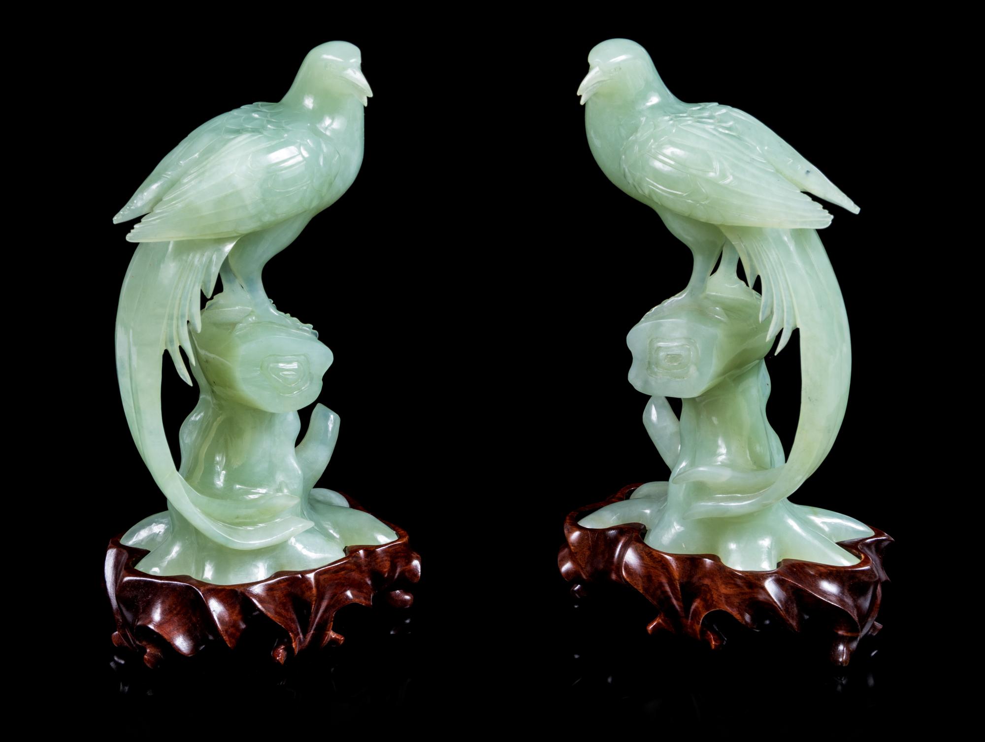 A Pair of Chinese Celadon Jade Figures of Pheasants Height of figure 6 3/4 inches. — 20TH CENTURY