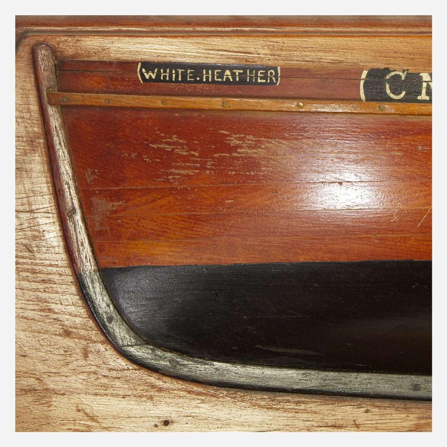 Two carved and painted half hull ship models late 19th/early 20th century