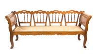 A French Provincial Fruitwood Bench Height 34 1/2 x width 76 1/2 x depth 19 1/2 inches. — LATE 19TH CENTURY