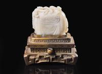 A Chinese carved white and grey jade "Elephant and Boys" group 太童子洗象玉雕