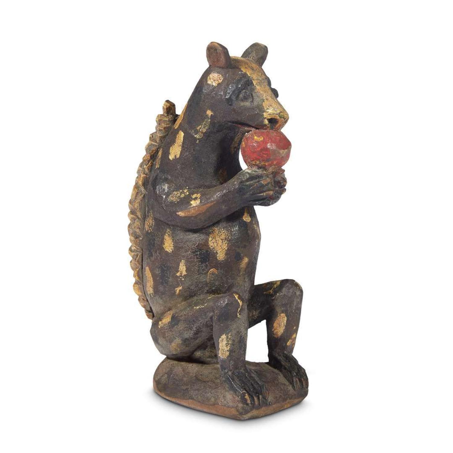 Carved and painted figure of a squirrel eating a nut in the manner of Wilhelm Schimmel (1817-1890) Robert Stauffer, late 20th century