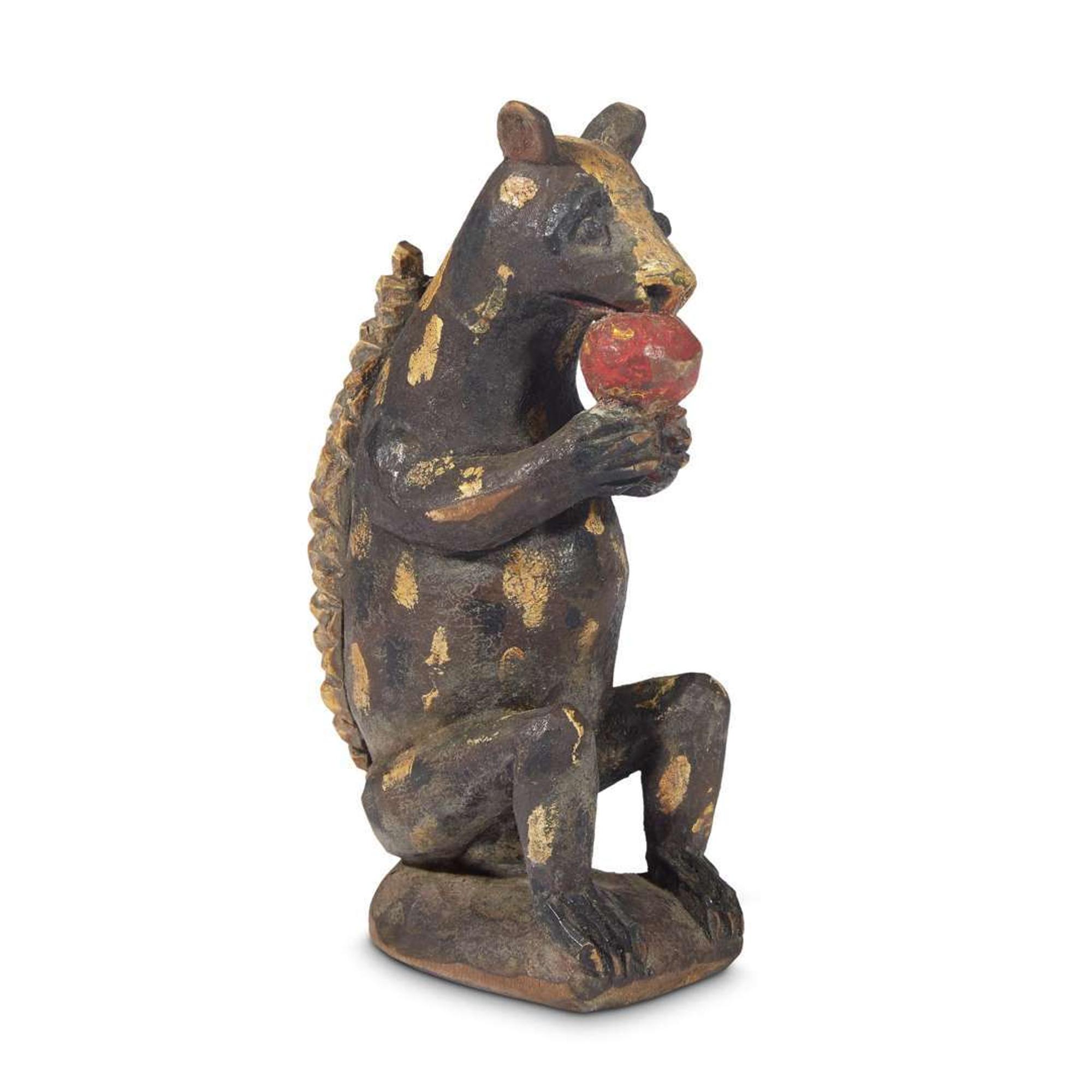 Carved and painted figure of a squirrel eating a nut in the manner of Wilhelm Schimmel (1817-1890) Robert Stauffer, late 20th century