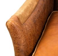 A Custom Leather Upholstered Camelback Sofa