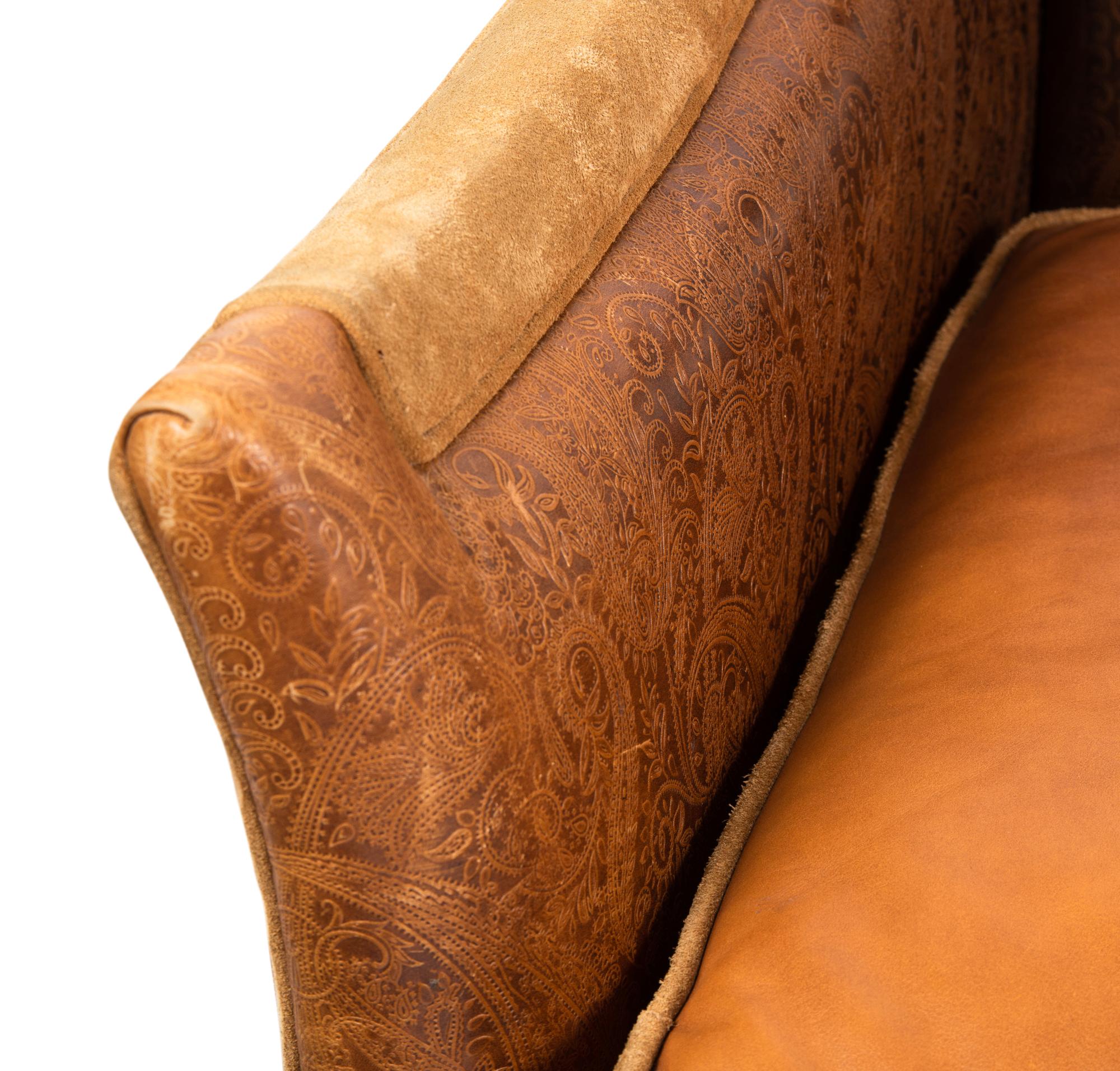 A Custom Leather Upholstered Camelback Sofa