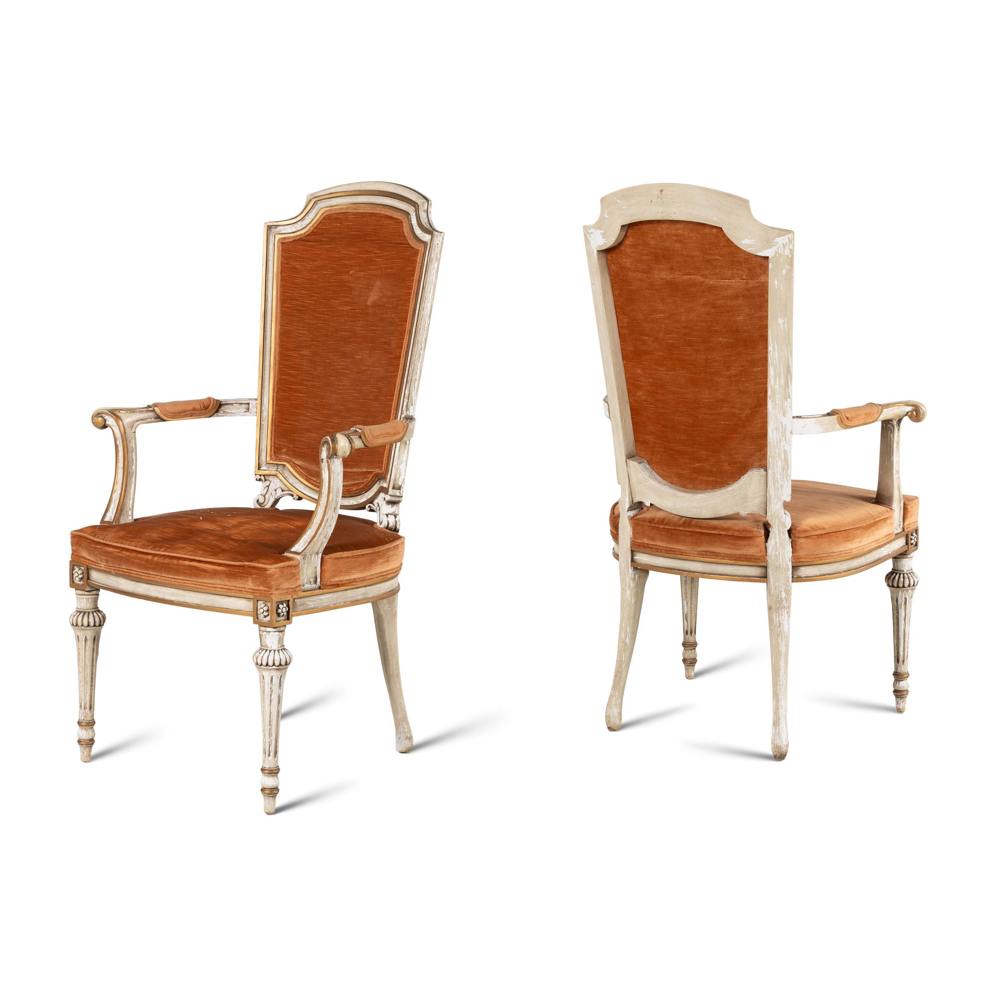 A Pair of Italian Crème-Painted and Parcel Gilt Armchairs