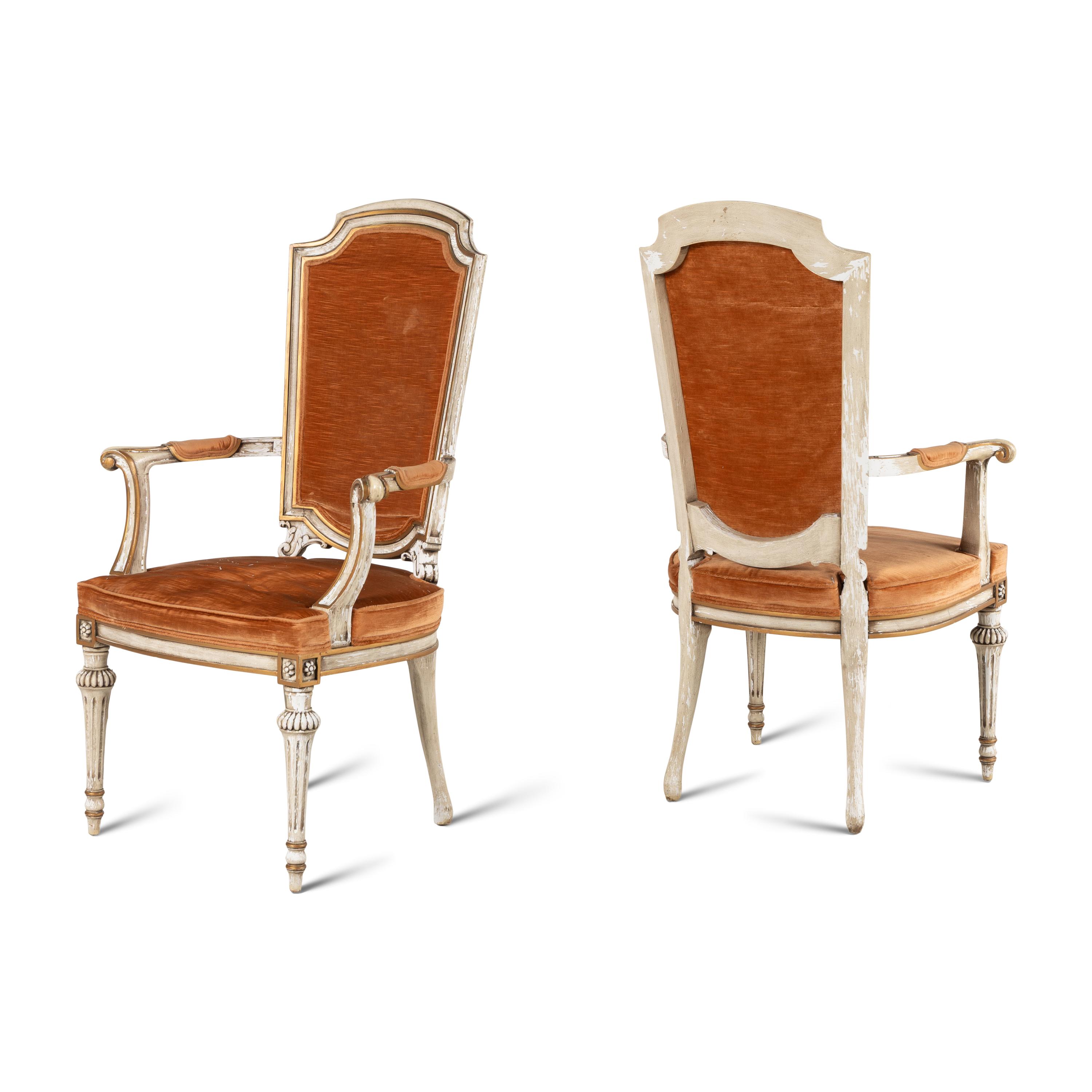 A Pair of Italian Crème-Painted and Parcel Gilt Armchairs