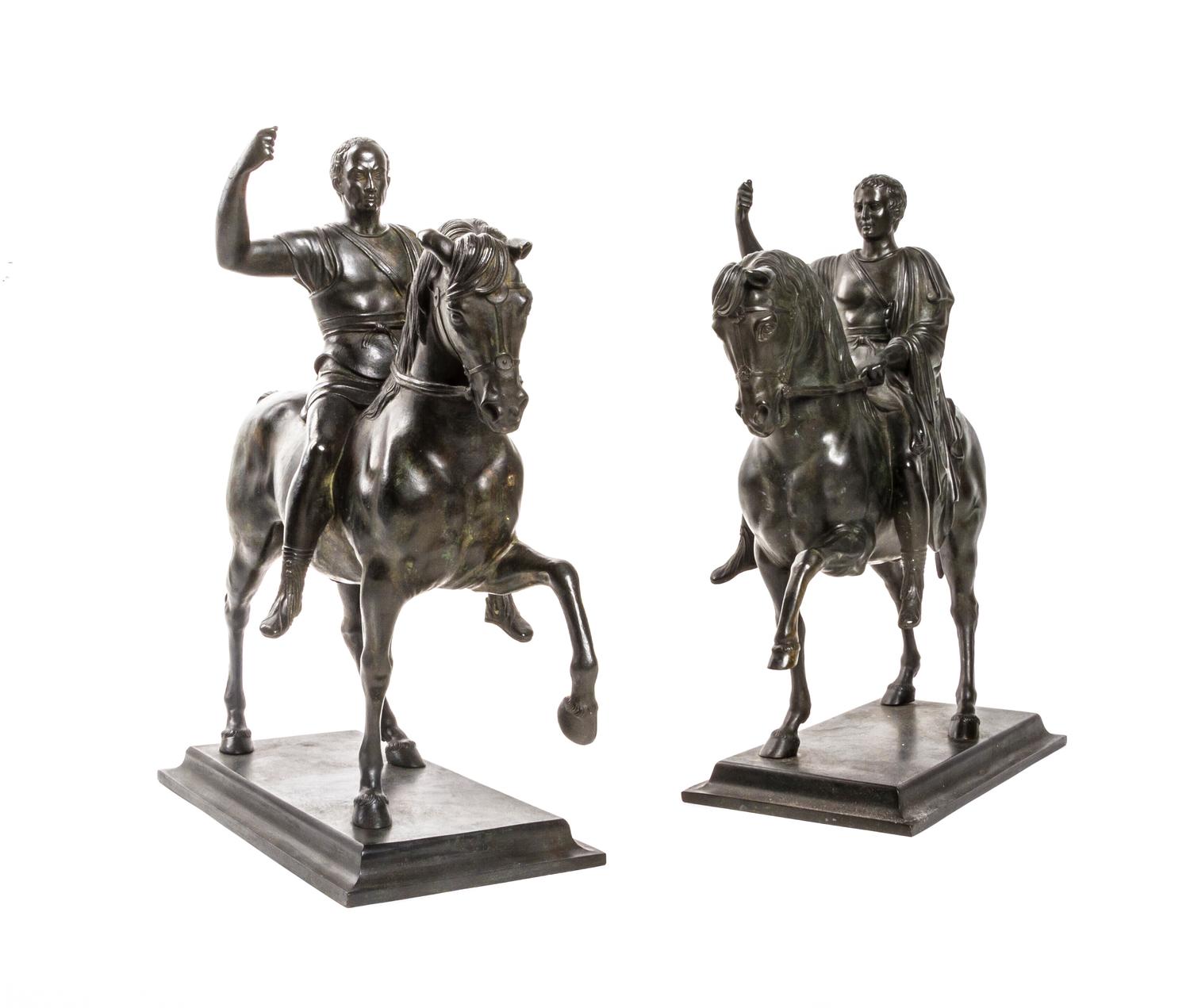 A Pair of Grand Tour Style Bronze Equestrian Groups, after the Antique, Height 14 1/2 inches.