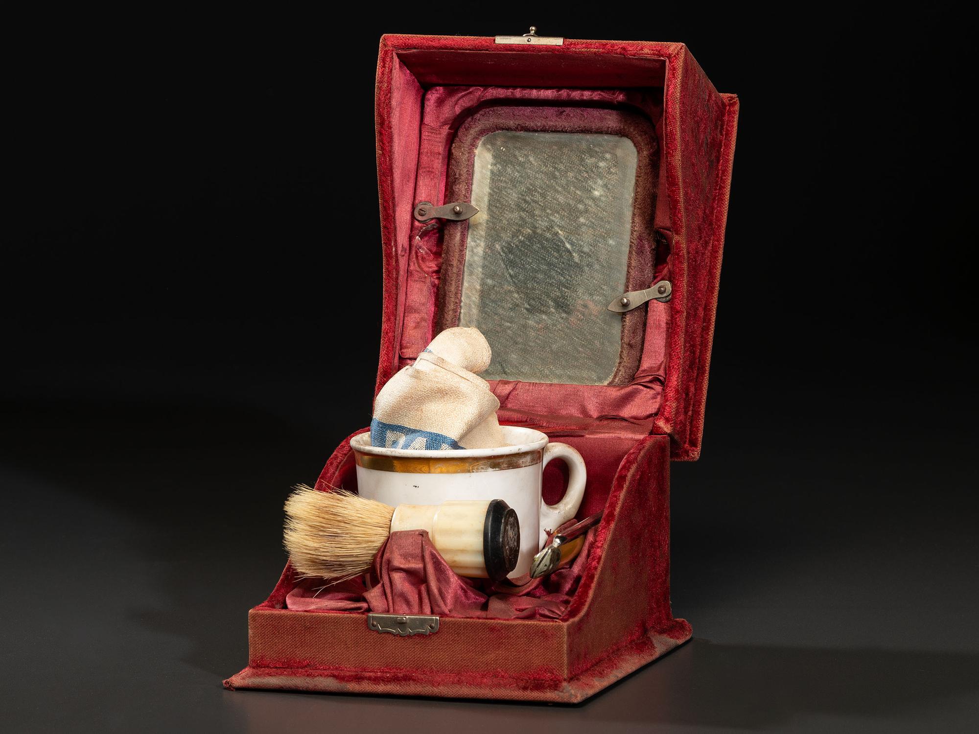 A Velvet-Covered Cased Shaving Compendium