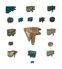 Seventeen Egyptian Faience Wadjet Eyes