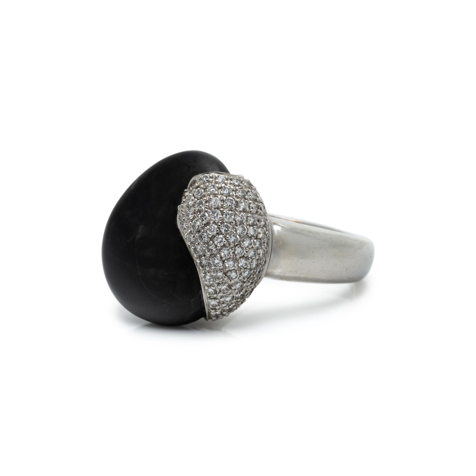 MOVADO, WHITE GOLD, PEBBLE AND DIAMOND SET