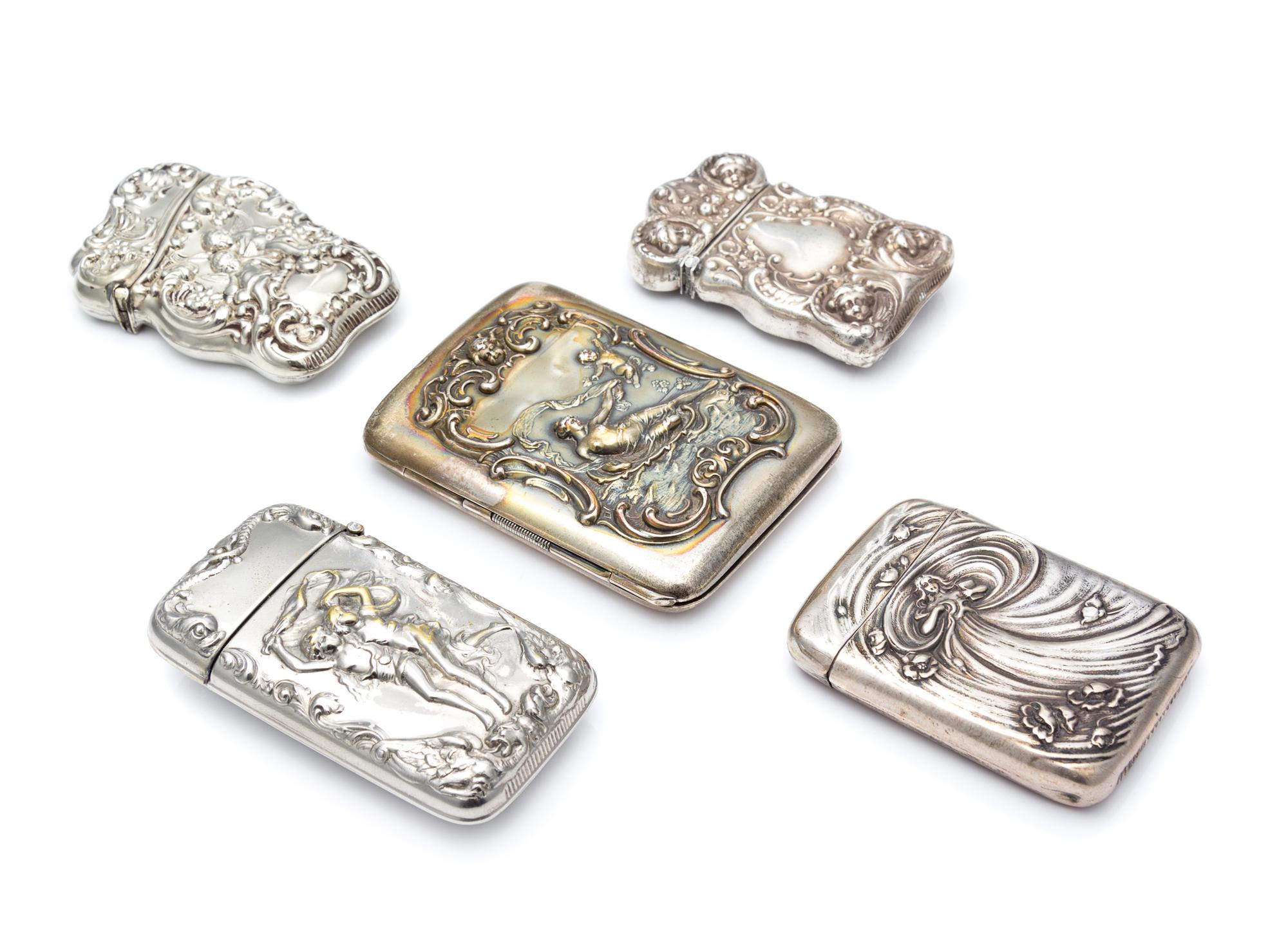 A Collection of Three American Silver Smoking Articles, Various Makers, comprising a cigarette case worked to show a reclining draped m