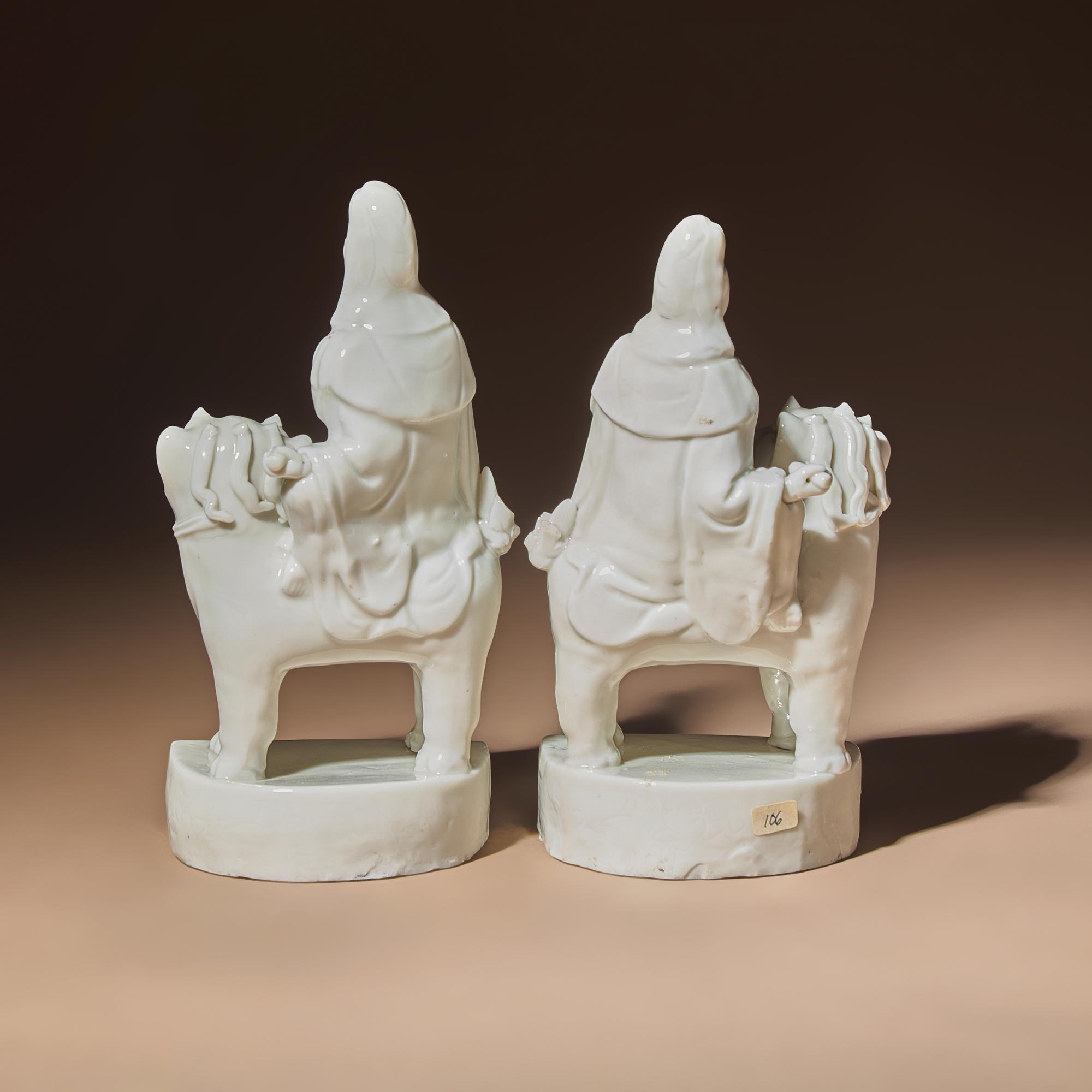A Matched Pair of Chinese Blanc-de-Chine Figural Groups of Bodhisattva Manjushri Sitting on Fu Lion, Late 17th Century — 清早期 德化白瓷文殊菩薩一對