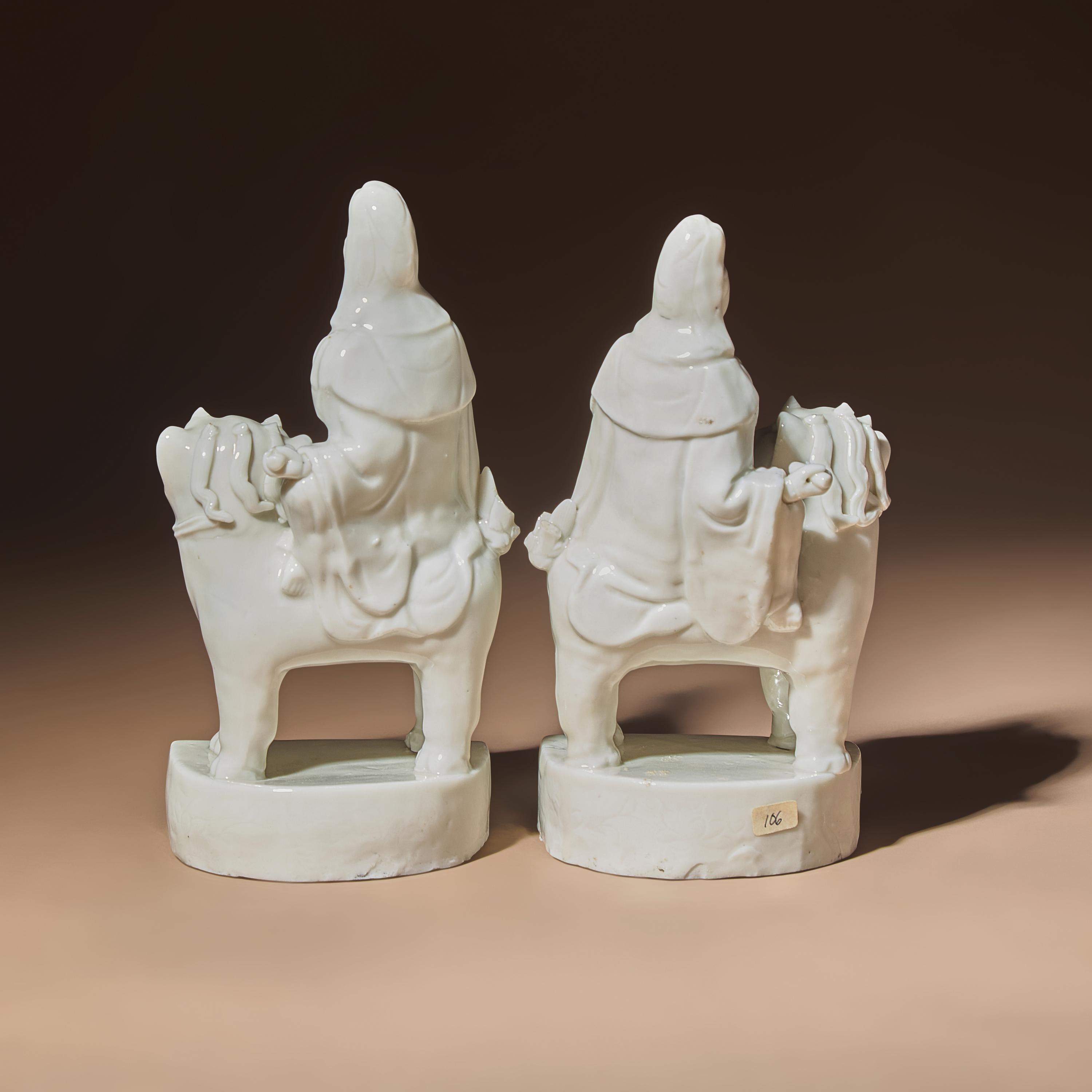A Matched Pair of Chinese Blanc-de-Chine Figural Groups of Bodhisattva Manjushri Sitting on Fu Lion, Late 17th Century — 清早期 德化白瓷文殊菩薩一對