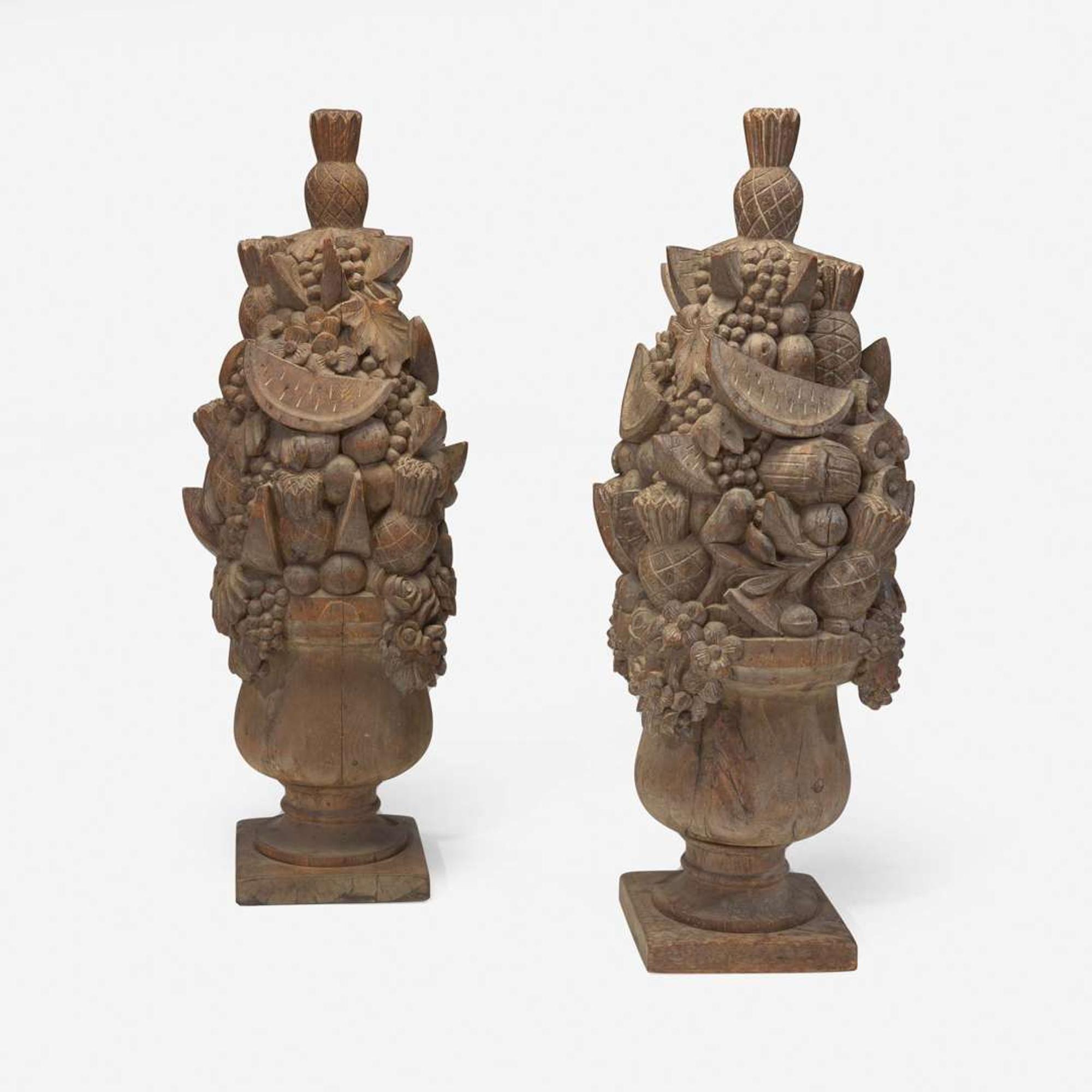 A pair of carved wooden fruit and flower arrangements circa 1855