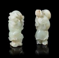 Two Pale Celadon Jade Figures of He He Er Xian Height of taller 3 1/4 inches. — 18TH/19TH CENTURY